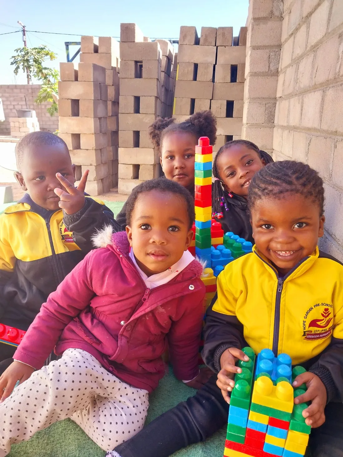 Hope Garden learners building with colourful blocks